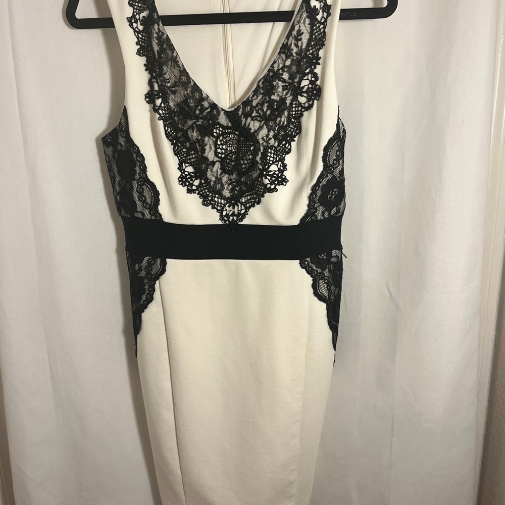 Jennifer Lopez Elegant Black and White Backless Dress